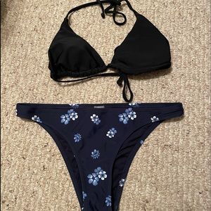 black top, navy blue bottoms w/ floral print